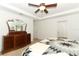 Relaxing main bedroom with a tray ceiling and access to the ensuite bathroom at 30413 Plymouth Creek Cir, Sorrento, FL 32776