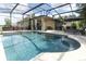 Large, private screened-in pool with an attached patio and covered seating area, ideal for enjoying the outdoors at 30413 Plymouth Creek Cir, Sorrento, FL 32776
