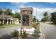 Neighborhood entrance featuring stone monument sign for Plymouth Creek Estates at 30413 Plymouth Creek Cir, Sorrento, FL 32776