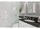 Modern bathroom showcases a glass-enclosed shower, a sleek vanity, and stylish decor at 3144 Players View Cir, Longwood, FL 32779