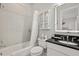 Bright bathroom featuring a shower-tub, vanity and sleek medicine cabinet for storage at 3144 Players View Cir, Longwood, FL 32779