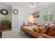 Bedroom with bright natural light, carpet, and stylish decor elements at 3144 Players View Cir, Longwood, FL 32779
