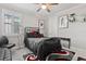 Bedroom featuring carpeted floors, a comfortable bed, and stylish furniture and decor at 3144 Players View Cir, Longwood, FL 32779