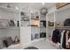 Walk-in closet features custom shelving and storage solutions at 3144 Players View Cir, Longwood, FL 32779