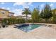 Backyard view showcasing the beautiful pool, tiled hot tub, and lush landscaping creating a private oasis at 3144 Players View Cir, Longwood, FL 32779