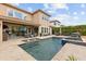 Beautiful backyard pool with tiled hot tub, fountains, and ample seating area perfect for entertaining at 3144 Players View Cir, Longwood, FL 32779
