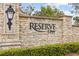Stone entrance sign for Reserve at Alagua community showcasing the upscale neighborhood at 3144 Players View Cir, Longwood, FL 32779