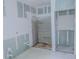 Unfinished bathroom featuring cement board shower surround and open layout at 315 E Magnolia St, Davenport, FL 33837
