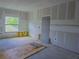 Bedroom features a window and a door ready for customization at 315 E Magnolia St, Davenport, FL 33837