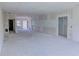 Expansive unfinished living room offering an open floor plan with abundant natural light at 315 E Magnolia St, Davenport, FL 33837