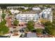 Aerial view of townhome community with brick streets, parking, and landscaping at 336 Center Lake Ln # A-2, Oviedo, FL 32765