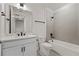 Bathroom featuring a single sink, tub, shower, tiled floors, and modern hardware at 336 Center Lake Ln # A-2, Oviedo, FL 32765