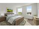 Comfortable bedroom with natural light, a serene view, and tasteful decor offers a peaceful retreat at 336 Center Lake Ln # A-2, Oviedo, FL 32765