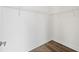 Walk-in closet with installed wire shelving and wood-look floor at 336 Center Lake Ln # A-2, Oviedo, FL 32765