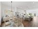 Open-concept dining area and kitchen with stylish decor and ample natural light offers a welcoming space at 336 Center Lake Ln # A-2, Oviedo, FL 32765