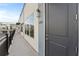 A modern exterior showcasing the front door, with a walkway and large windows, and a visible unit number at 336 Center Lake Ln # A-2, Oviedo, FL 32765