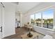 A bright living area with a large window, dining table and kitchen view at 336 Center Lake Ln # A-2, Oviedo, FL 32765
