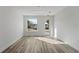 Bright living room with a large window and an exit to the outdoors at 336 Center Lake Ln # A-2, Oviedo, FL 32765