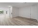 Spacious living room with light gray vinyl floors and natural light at 336 Center Lake Ln # A-2, Oviedo, FL 32765