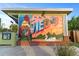 Charming 'Greetings From Oviedo' mural, featuring colorful local imagery and landmarks at 336 Center Lake Ln # A-2, Oviedo, FL 32765