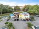 Aerial view of Town House Restaurant with parking, patio, and nearby playground at 336 Center Lake Ln # A-2, Oviedo, FL 32765