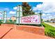 Eye-catching 'Oviedo on the Park' sign on brick base, surrounded by greenery at 336 Center Lake Ln # A-2, Oviedo, FL 32765