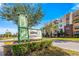 Well-maintained sign for Center Lake Park with lush landscaping and modern apartments in the background at 336 Center Lake Ln # A-2, Oviedo, FL 32765