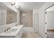 Bathroom features double vanity, marble tile shower and tub at 33830 S Haines Creek Rd, Leesburg, FL 34788