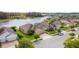 Lakeside neighborhood featuring stunning homes and lush landscaping in a serene setting at 3936 Parkhouse Dr, Orlando, FL 32824