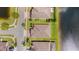 An aerial view of houses with backyard views of a lakeside community at 3936 Parkhouse Dr, Orlando, FL 32824