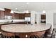 Spacious kitchen with granite island, stainless steel appliances, and ample storage at 3936 Parkhouse Dr, Orlando, FL 32824