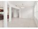 Bright and airy living room with neutral tile flooring and abundant natural light at 3936 Parkhouse Dr, Orlando, FL 32824