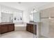 Bright bathroom with a soaking tub, a frameless shower, granite counters, and a window with decorative plants at 3936 Parkhouse Dr, Orlando, FL 32824
