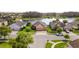 Beautifully landscaped street with well maintained homes in a lakeside community at 3936 Parkhouse Dr, Orlando, FL 32824