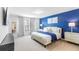 Cozy bedroom with a comfortable bed, stylish decor, and abundant natural light at 3966 Lana Ave, Davenport, FL 33897