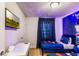 Fun bedroom with starry night theming and a wall-mounted TV at 3966 Lana Ave, Davenport, FL 33897