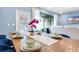 Elegant dining room with a modern table setting, perfect for memorable gatherings and dining at 3966 Lana Ave, Davenport, FL 33897