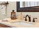 Close up on the bathroom vanity featuring a stylish sink, countertop, and decor at 408 Almeria Ct, Winter Springs, FL 32708