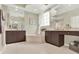 Luxurious bathroom with a soaking tub, dual vanities, and elegant finishes for relaxation at 408 Almeria Ct, Winter Springs, FL 32708