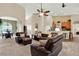 Open-concept living area with vaulted ceilings and a view of the dining room and kitchen at 408 Almeria Ct, Winter Springs, FL 32708