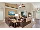 Cozy living room with comfortable seating, accent lighting, and an open layout to the dining area at 408 Almeria Ct, Winter Springs, FL 32708