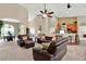 Spacious open-concept living room flowing into the kitchen and dining area at 408 Almeria Ct, Winter Springs, FL 32708