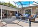 Outdoor patio area with comfortable seating, a fire pit, and a dining set at 408 Almeria Ct, Winter Springs, FL 32708