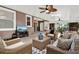 Relaxing sunroom features tile floors, wicker seating, and outdoor views at 408 Almeria Ct, Winter Springs, FL 32708