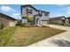 Charming two-story home with landscaped yard and attached two-car garage at 4346 Trotters Way, Lakeland, FL 33801