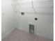 Laundry room with white walls, tile floors, and hookups ready for your washer and dryer at 4346 Trotters Way, Lakeland, FL 33801