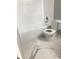 The bathroom features a toilet, tub, and marble pattern tile floor at 480 Banyon Tree Cir # 100, Maitland, FL 32751