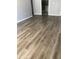 Spacious living room features beautiful wood-style floors and neutral paint, creating a cozy atmosphere at 480 Banyon Tree Cir # 100, Maitland, FL 32751