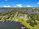 Lakefront properties with private docks and lush greenery offer an idyllic and peaceful waterfront lifestyle at 49 Interlaken Rd, Orlando, FL 32804