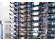 Close-up view of the modern wine storage area, highlighting its elegant design and ample space for wine bottles at 49 Interlaken Rd, Orlando, FL 32804